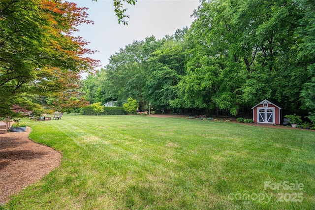 133 Castaway Trl, Mooresville, NC 28117 - view of grassy yard with a shed and an outbuilding