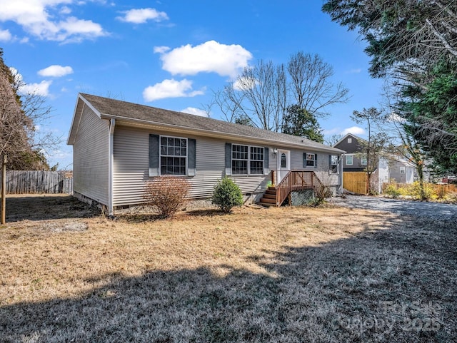 view of front of home with a front lawn