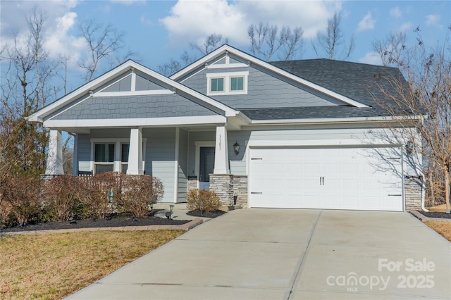 craftsman-style home with a garage and a porch