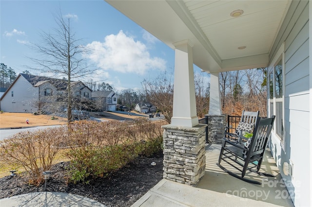 view of patio featuring a porch