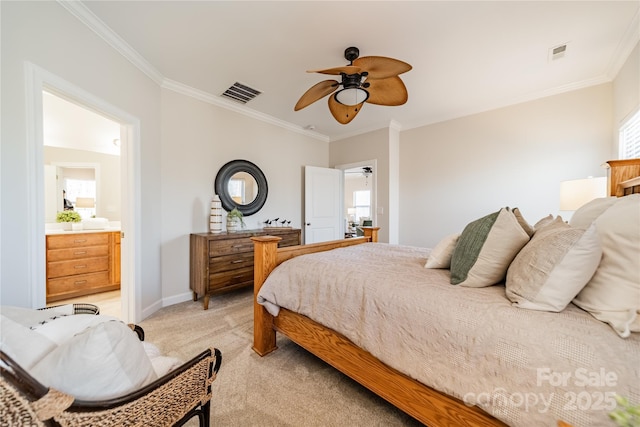 carpeted bedroom with ornamental molding and ceiling fan