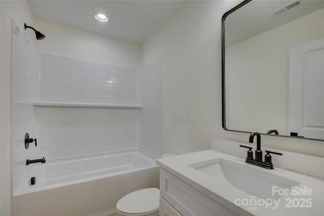 full bathroom with vanity, shower / bathtub combination, and toilet