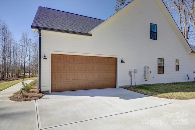 view of property exterior featuring a garage