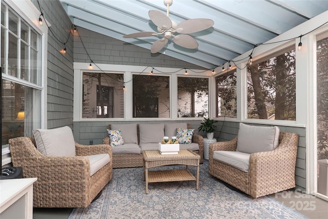 sunroom with vaulted ceiling and ceiling fan