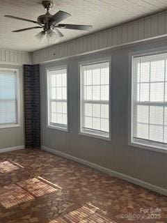 empty room featuring ceiling fan