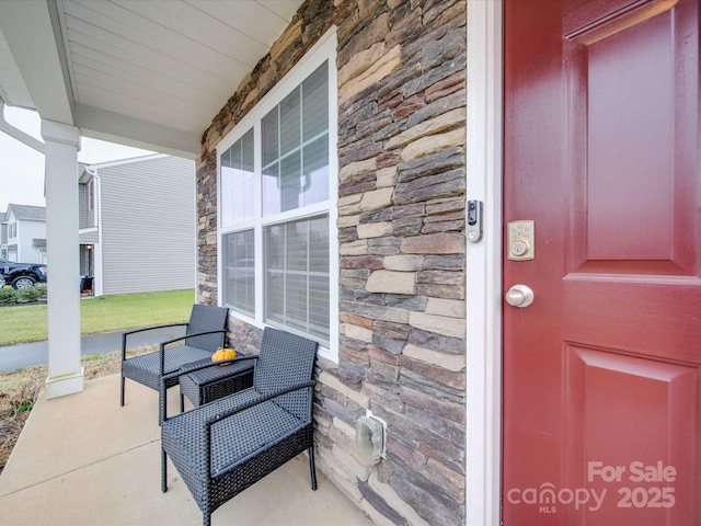 entrance to property with covered porch