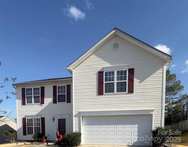 view of front of home with a garage