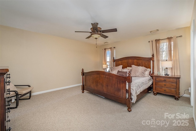 bedroom with light colored carpet and ceiling fan