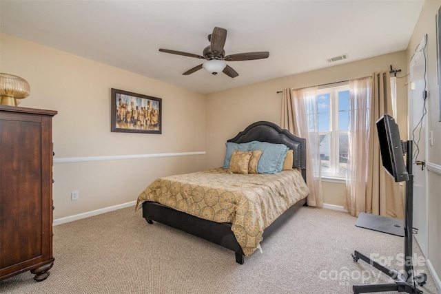 bedroom with light carpet and ceiling fan