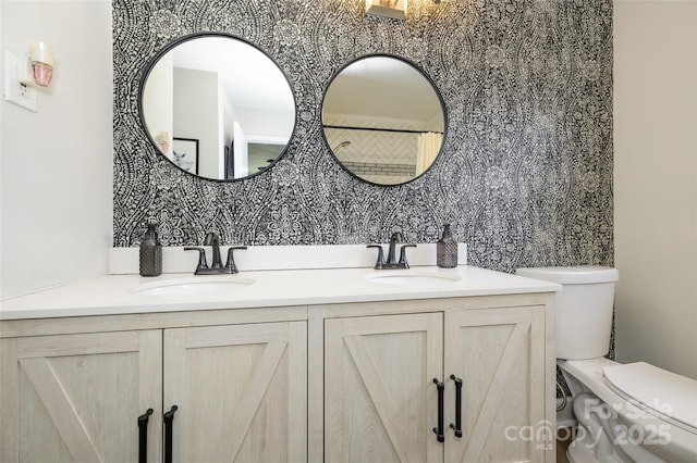 bathroom with vanity and toilet