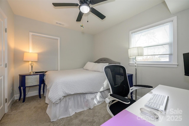 carpeted bedroom featuring ceiling fan