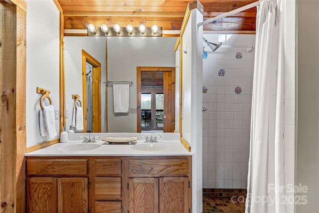 bathroom featuring vanity and a shower with curtain