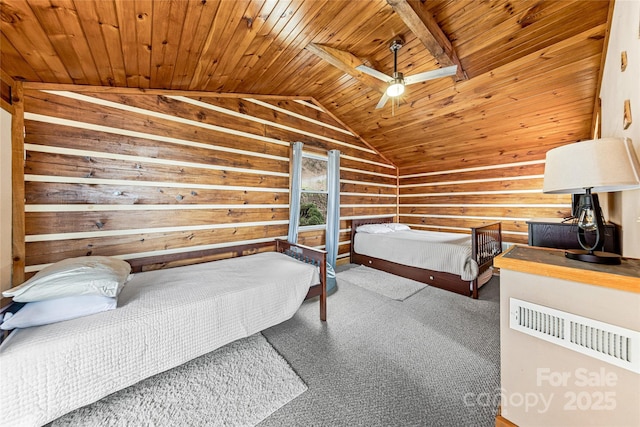 bedroom with vaulted ceiling with beams, wooden ceiling, and wood walls