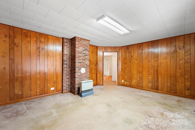 unfurnished living room with light colored carpet