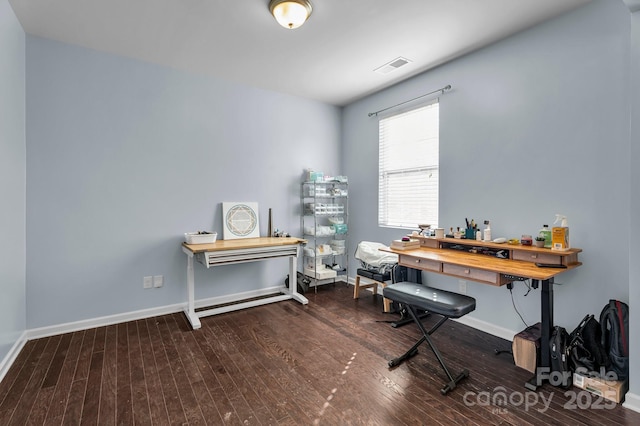 miscellaneous room featuring dark hardwood / wood-style floors