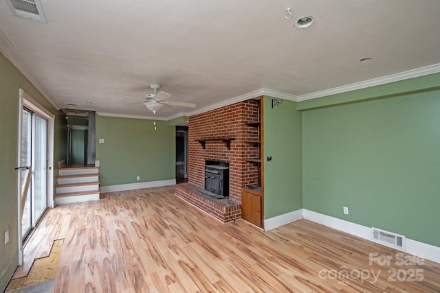 unfurnished living room with crown molding, ceiling fan, and light hardwood / wood-style floors