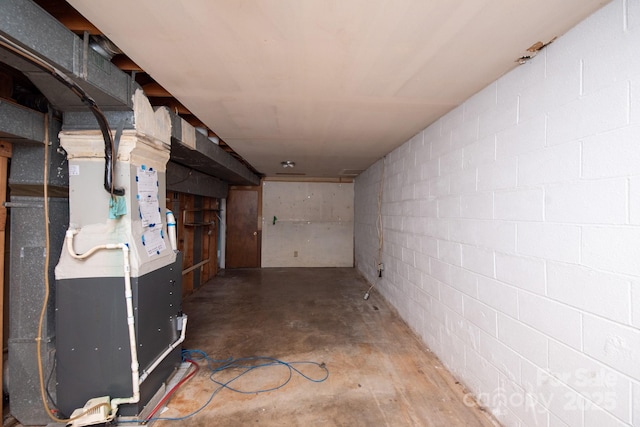 basement featuring heating unit