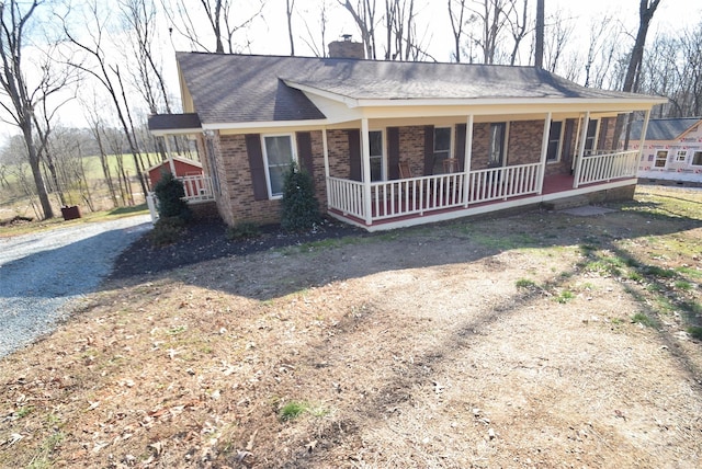 ranch-style home with covered porch