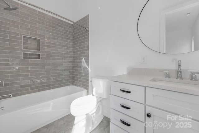 full bathroom featuring vanity, toilet, tiled shower / bath combo, and tile patterned flooring