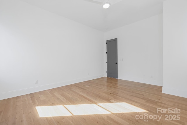 empty room with light wood-type flooring