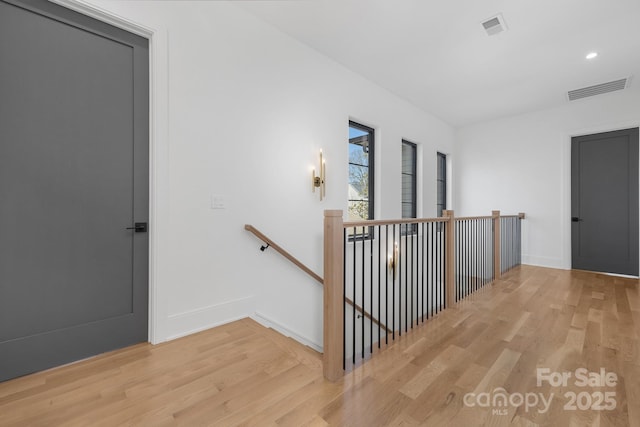 hallway featuring light wood-type flooring