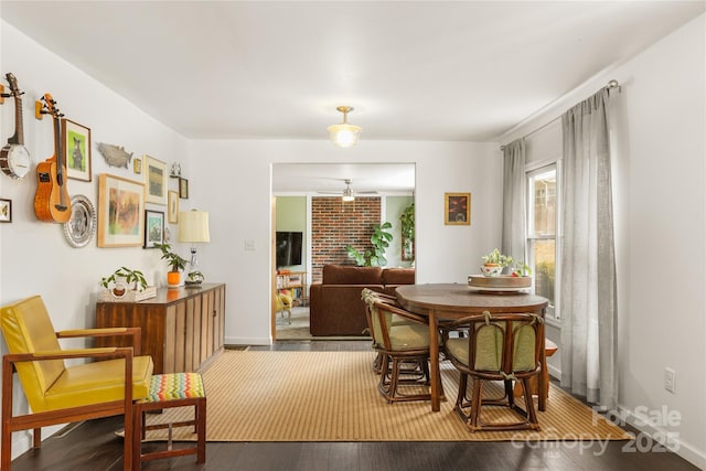 dining room featuring wood-type flooring