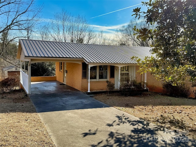 ranch-style home with a carport