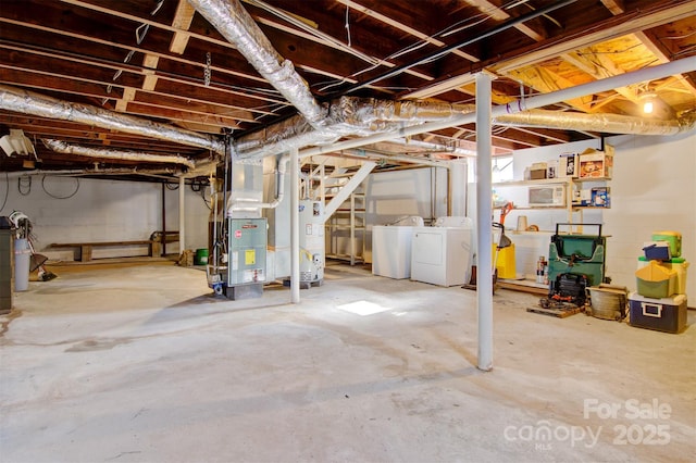 basement with separate washer and dryer, heating unit, and water heater