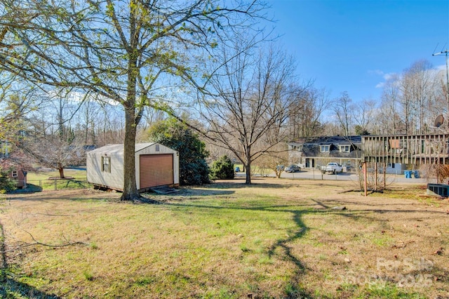 view of yard featuring a garage