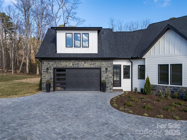 view of front of property with a garage