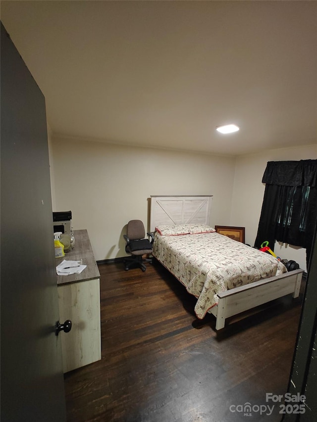 3103 Minnesota Rd, Charlotte, NC 28208 - bedroom featuring dark hardwood / wood-style floors