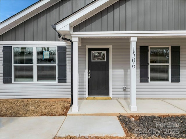 doorway to property with a porch