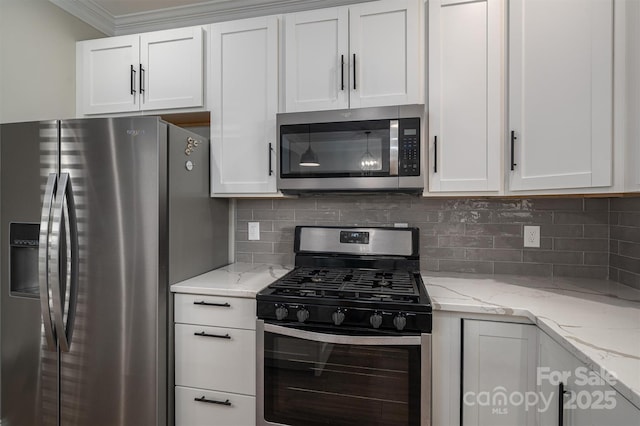 kitchen with stainless steel appliances, light stone countertops, white cabinets, and decorative backsplash