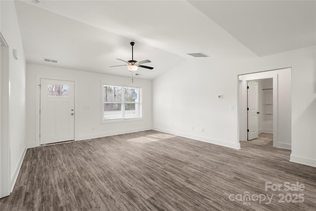 unfurnished living room featuring lofted ceiling, hardwood / wood-style floors, and ceiling fan