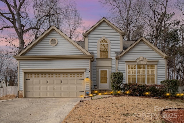 front of property with a garage