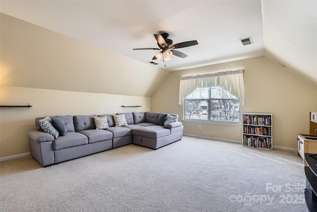 living room with lofted ceiling, ceiling fan, and carpet