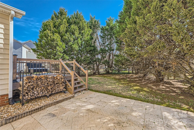 view of patio with a deck