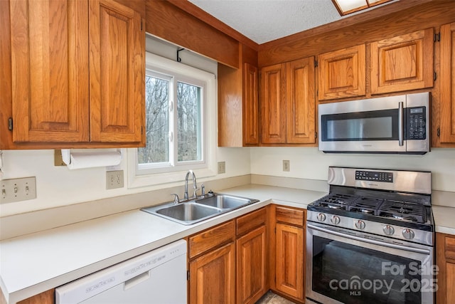 kitchen featuring stainless steel appliances and sink