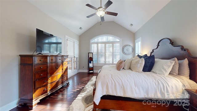 bedroom with vaulted ceiling, dark wood-type flooring, and ceiling fan