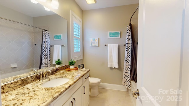 full bathroom with tile patterned flooring, vanity, toilet, and shower / bath combo with shower curtain