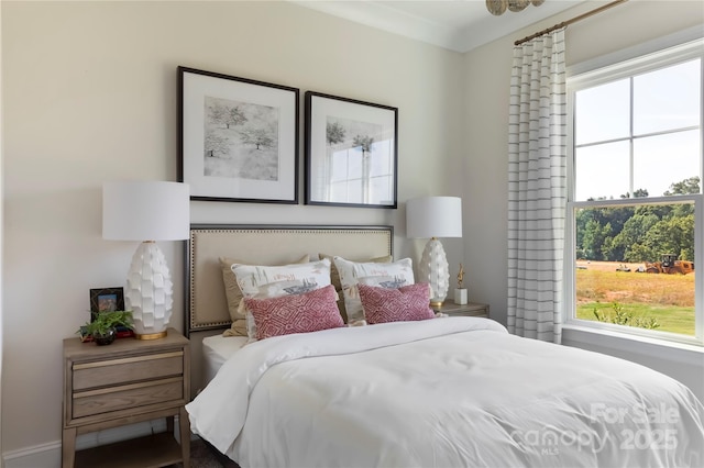 bedroom featuring ornamental molding