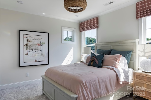 bedroom featuring light carpet and crown molding