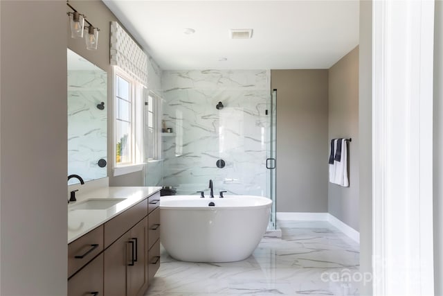 bathroom featuring vanity and shower with separate bathtub