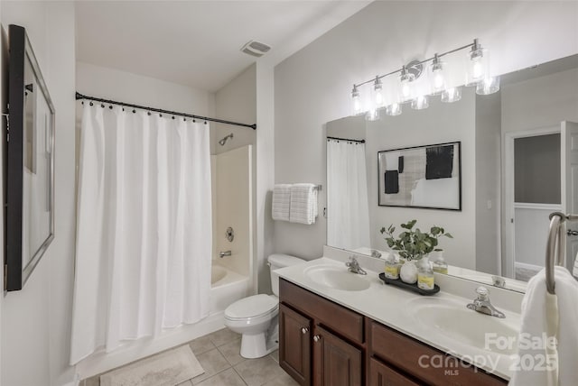 full bathroom with shower / tub combo with curtain, vanity, toilet, and tile patterned flooring