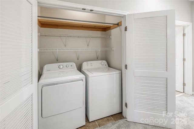 laundry room with independent washer and dryer