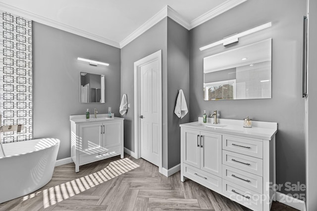 bathroom featuring vanity, a tub to relax in, ornamental molding, and parquet floors