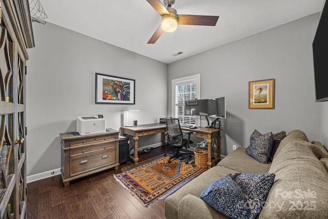 office space with dark hardwood / wood-style floors and ceiling fan