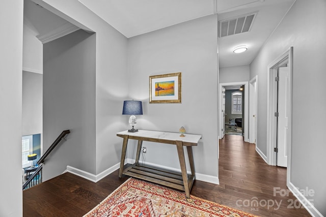 hall with dark wood-type flooring