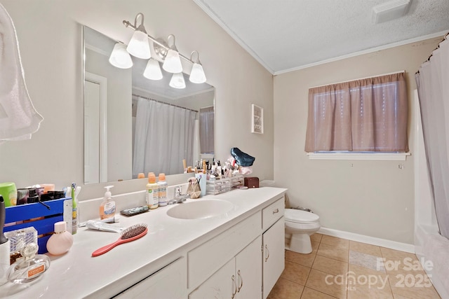 bathroom with tile patterned floors, toilet, crown molding, a textured ceiling, and vanity