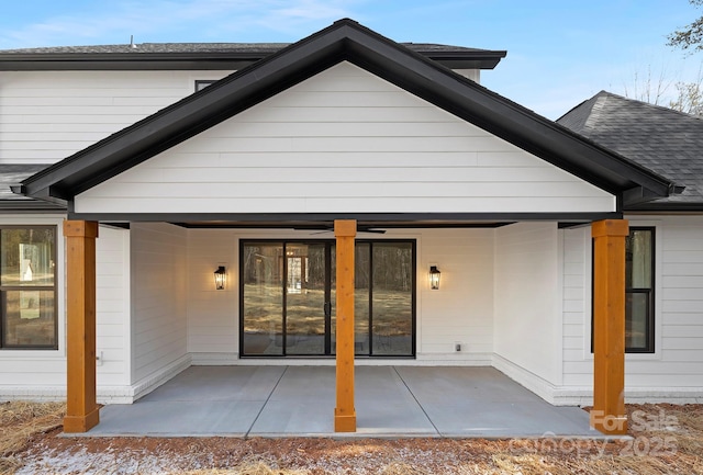 rear view of house featuring a patio area